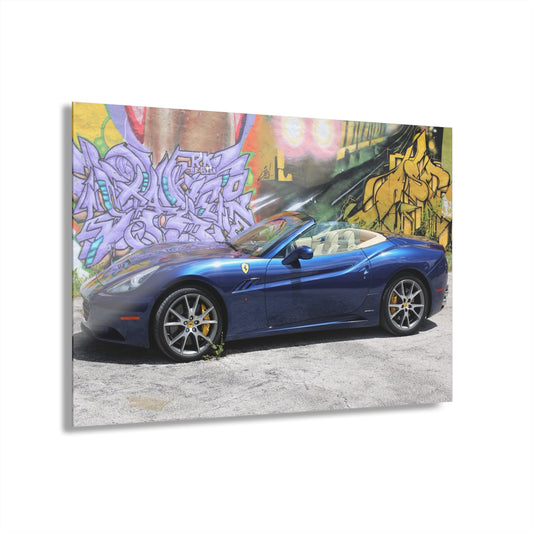 Ferrari California in deep ocean blue, captured against a vibrant urban graffiti mural.Modern Acrylic Print - Urban Car Art for Home Decor